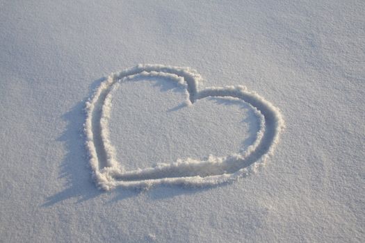 Heart painted on the snow