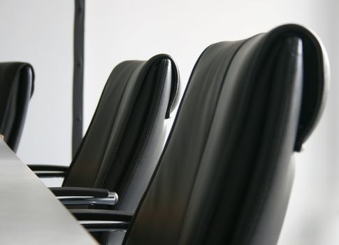 some chairs in a conference room