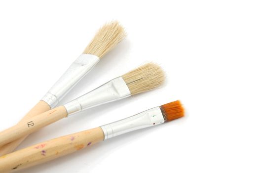 three brushes isolated on a white background