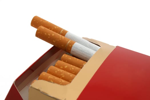 a cigarette box with two cigarettes sticking out