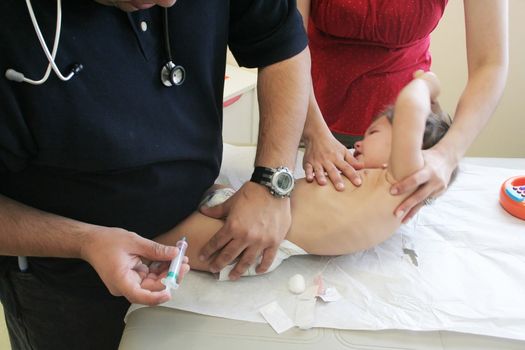 Young child getting a vaccination