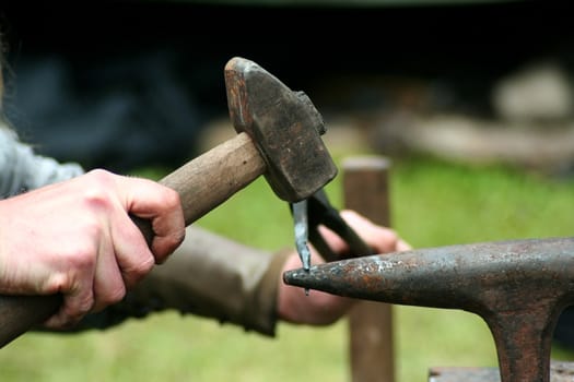 A medieval smith at the forge