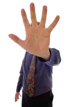 A senior businessman, in shirtsleeves, holding up his hand fingers outspread.