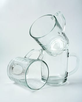 Three empty glass mugs, Isolated (look similar images in my portfolio)
