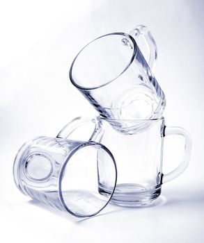 Three empty glass mugs, Isolated (look similar images in my portfolio)