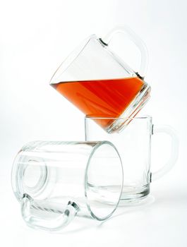 Three glass mugs and black tea, Isolated (look similar images in my portfolio)