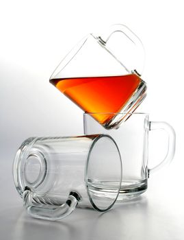 Three glass mugs and black tea, Isolated (look similar images in my portfolio)