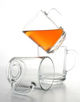 Three glass mugs and black tea, Isolated (look similar images in my portfolio)