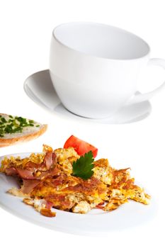 scrambled eggs and bun on a plate isolated on white