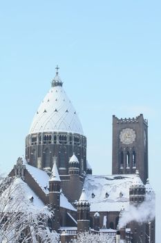 The saint Bavo cathedral in Haarlem, wintertime, covered in snow