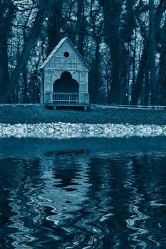 Gazebo on the lake at night fall