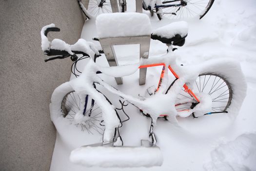 a mountainbike covered under a lot of snow