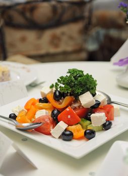 Greek salad in plate on a table