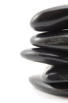 black stones in balance isolated on white background