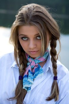 Portrait of young sexual girl on lake background