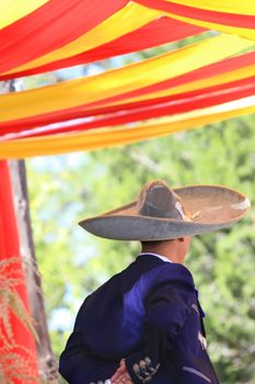 Dancer performing the Mexican Hat Dance at harvest fiesta on 400 year old hacienda.