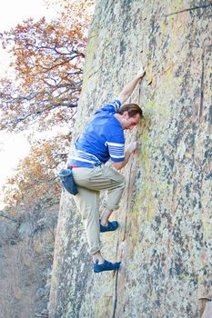 rock climber scalling a wall