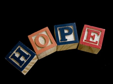 The word hope spelled out in children's toy blocks