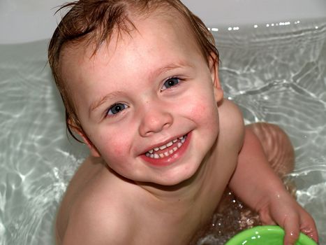 happy boy in bath
