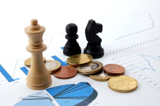 chess man over business chart admonish to strategic behavior