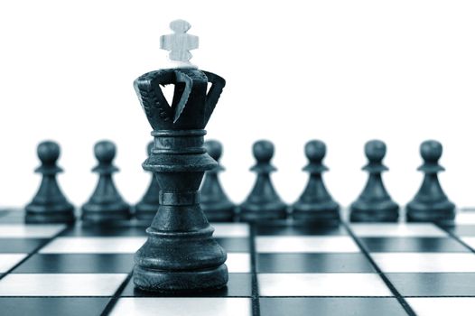 chess pieces on chess board showing concept for success and power
