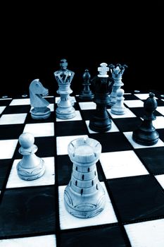 chess pieces on chess board showing competition success and strategy in business