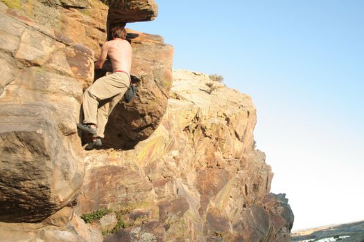 rock climber scalling a wall