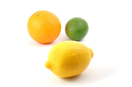 fresh lemon , orange , and citron fruits isolated on a white background