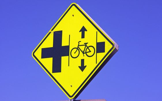 warning sign for bikers travel lane