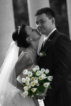 Newly-married couple in park