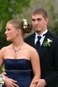 Happy young couple in formal attire