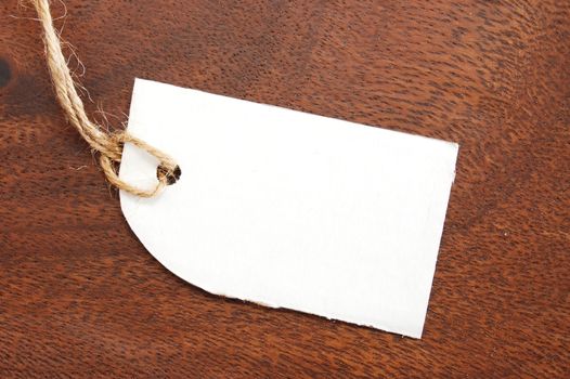 blank price tag with copyspace on wood