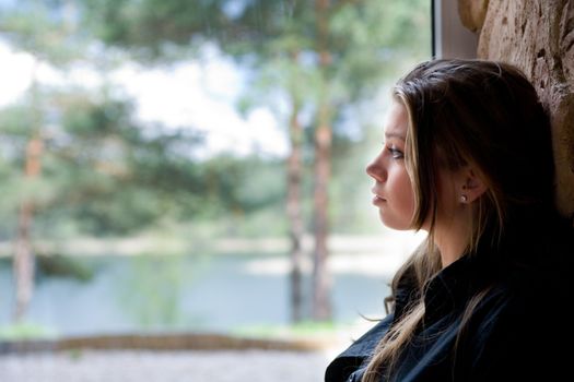 Silhouette of the girl in windows
