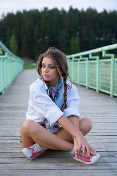  Portrait of young sexual girl on lake background