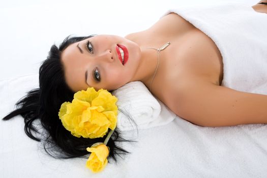 Attractive woman getting spa treatment on white