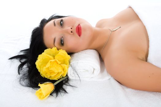 Attractive woman getting spa treatment on white
