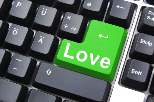 online love concept with colored button on computer keyboard