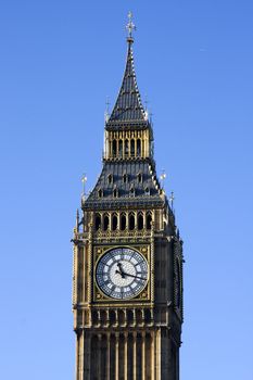 Close up of Big Ben Clock Tower, Westminster, London England on a sunny day with a blue sky