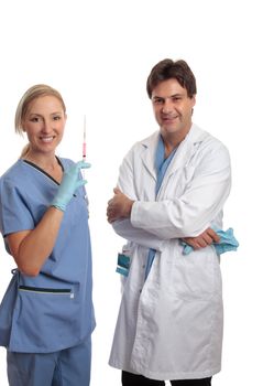 A male surgeon and female scrub nurse in uniform standing casually together.