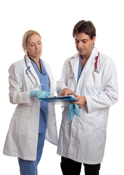 Surgeon and doctor or nurse read over and discuss a sick patients medical treatment, or healthcare history.