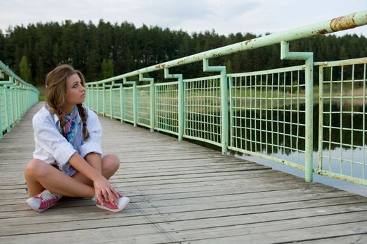  Portrait of young sexual girl on lake background