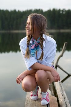  Portrait of young sexual girl on lake background