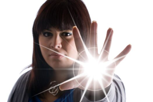 A woman with special powers shooting a burst of light or energy of some sort from the palm of her hand.