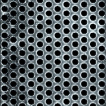 A metal air vent or wire mesh grill plate material with a grungy worn finish.