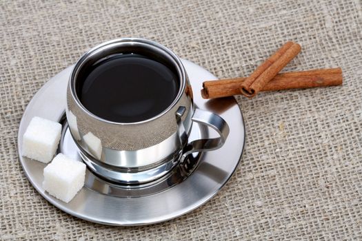 Cup of black coffee with cinnamon, coffee series