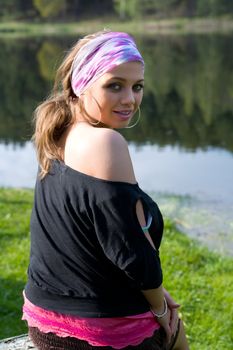  Portrait of young sexual girl on lake background