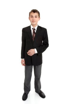 Secondary school student standing in uniform.  White background.  Shadow left under feet.