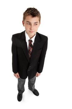 Secondary school student looking sideways - with copyspace, shadow left under feet.