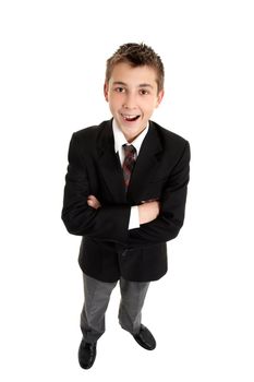 A smiling school boy wearing uniform.  He is standing on white background.
