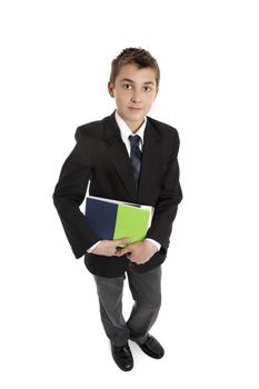 High school student in uniform holding text books.  On a white background, shadow under feet.